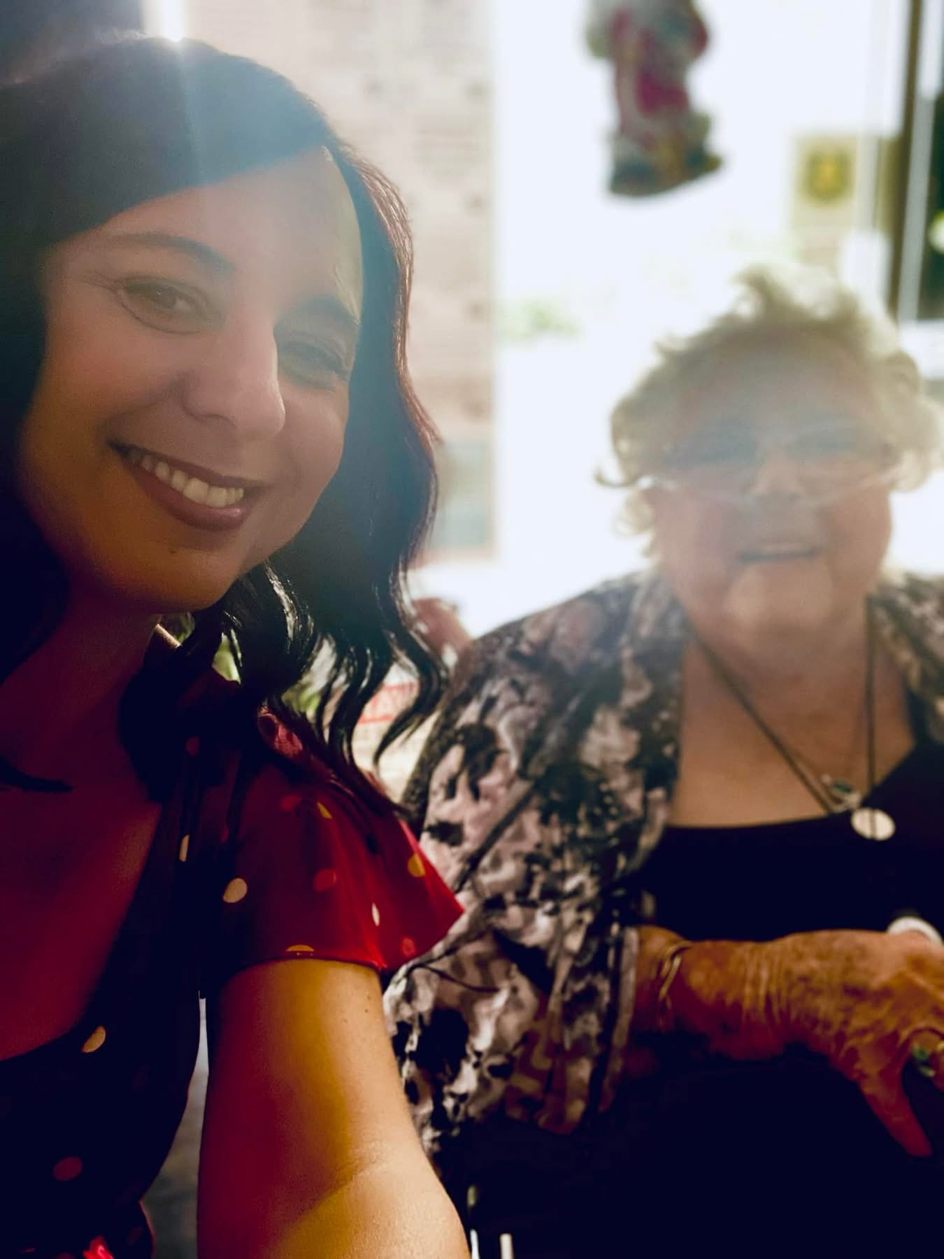 Belinda and her Nan together — 'a vision in red'